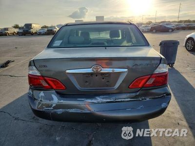 Zdjęcie 6 z 12 samochodu: 2000 TOYOTA AVALON XLS VIN:4T1BF28BXYU079525 - miniatura