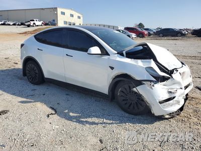 Czwarte zdjęcie samochodu z boku: 2023 TESLA MODEL Y VIN:7SAYGDEE9PA063295 - miniatura