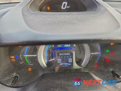 Zdjęcie 9 z 11 samochodu: 2010 HONDA INSIGHT EX VIN:JHMZE2H7XAS018760 - miniatura