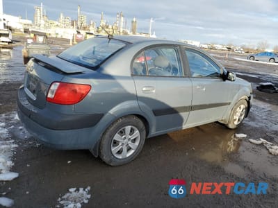 Trzecie zdjęcie samochodu z tyłu: 2009 KIA RIO BASE VIN:KNADE223296566738 - miniatura