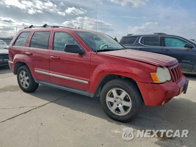 Czwarte zdjęcie samochodu z boku: 2010 JEEP GRAND CHEROKEE LAREDO VIN:1J4PR4GK6AC106420 - miniatura