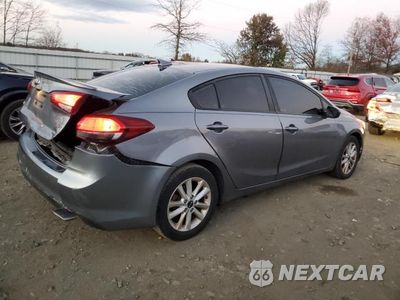 Trzecie zdjęcie samochodu z tyłu: 2017 KIA FORTE LX VIN:3KPFL4A77HE160464 - miniatura