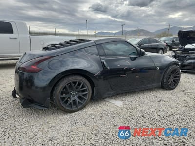 Trzecie zdjęcie samochodu z tyłu: 2009 NISSAN 370Z VIN:JN1AZ44E39M406760 - miniatura