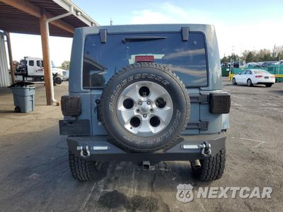 Zdjęcie 6 z 14 samochodu: 2014 JEEP WRANGLER UNLIMITED SAHARA VIN:1C4HJWEG5EL210785 - miniatura