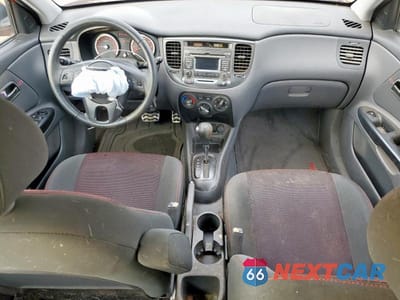 Zdjęcie 8 z 13 samochodu: 2010 KIA RIO LX VIN:KNADH5A33A6659055 - miniatura