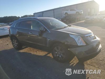 Czwarte zdjęcie samochodu z boku: 2014 CADILLAC SRX LUXURY COLLECTION VIN:3GYFNEE33ES561167 - miniatura
