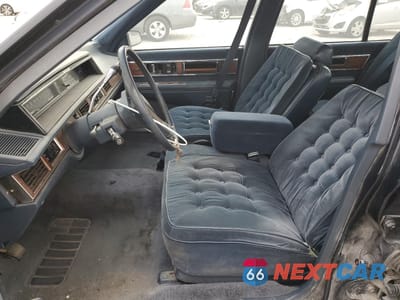 Zdjęcie 7 z 14 samochodu: 1990 OLDSMOBILE 98 REGENCY VIN:1G3CX54CXL4356754 - miniatura
