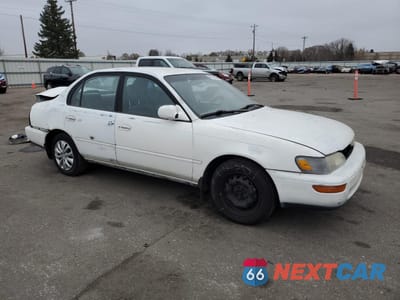 Czwarte zdjęcie samochodu z boku: 1996 TOYOTA COROLLA DX VIN:2T1BB02E1TC175010 - miniatura