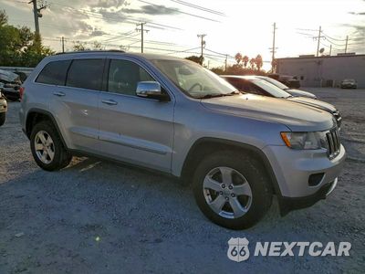 Czwarte zdjęcie samochodu z boku: 2013 JEEP GRAND CHEROKEE LIMITED VIN:1C4RJFBT8DC532745 - miniatura