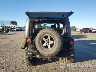 Zdjęcie 6 z 12 samochodu: 2010 JEEP WRANGLER UNLIMITED RUBICON VIN:1J4BA6H11AL228573 - miniatura