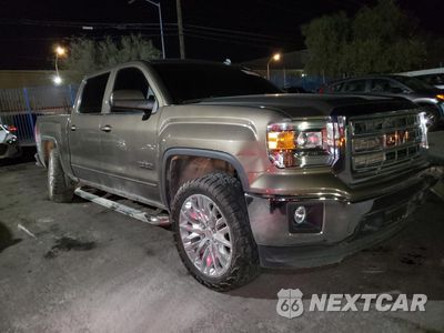 Czwarte zdjęcie samochodu z boku: 2014 GMC SIERRA C1500 SLE VIN:3GTP1UEC3EG553363 - miniatura