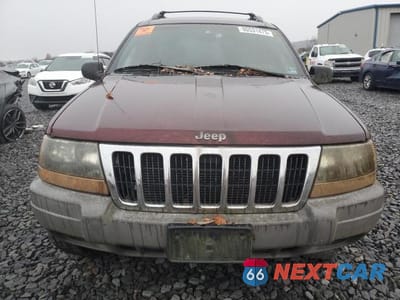 Piąte zdjęcie samochodu w środku: 1999 JEEP GRAND CHEROKEE LAREDO VIN:1J4GW58SXXC566847 - miniatura