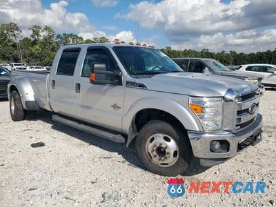 Czwarte zdjęcie samochodu z boku: 2015 FORD F350 SUPER DUTY VIN:1FT8W3CT1FEA92434 - miniatura