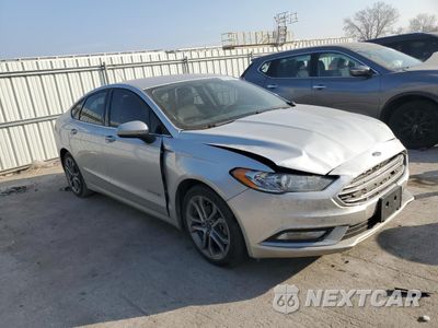 Czwarte zdjęcie samochodu z boku: 2017 FORD FUSION SE HYBRID VIN:3FA6P0LU5HR314328 - miniatura