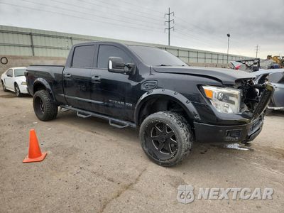 Czwarte zdjęcie samochodu z boku: 2017 NISSAN TITAN XD SL VIN:1N6BA1F40HN556780 - miniatura