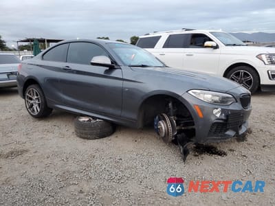 Czwarte zdjęcie samochodu z boku: 2014 BMW M235I VIN:WBA1J7C52EVW84719 - miniatura