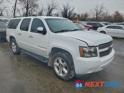 Czwarte zdjęcie samochodu z boku: 2007 CHEVROLET SUBURBAN K1500 VIN:3GNFK163X7G232064 - miniatura