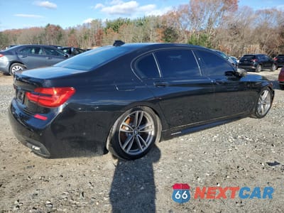 Trzecie zdjęcie samochodu z tyłu: 2017 BMW 740 I VIN:WBA7E2C51HG740336 - miniatura
