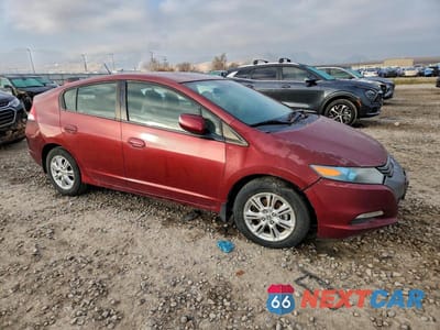 Czwarte zdjęcie samochodu z boku: 2010 HONDA INSIGHT EX VIN:JHMZE2H7XAS018760 - miniatura