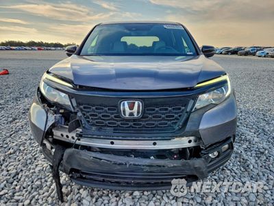 Piąte zdjęcie samochodu w środku: 2021 HONDA PASSPORT EXL VIN:5FNYF7H52MB010448 - miniatura