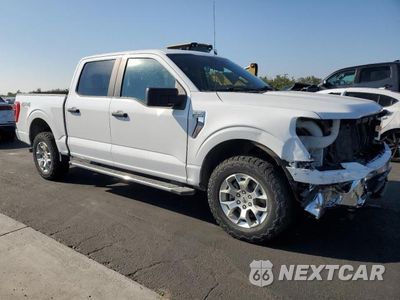 Czwarte zdjęcie samochodu z boku: 2021 FORD F150 SUPERCREW VIN:1FTFW1E86MFA61420 - miniatura