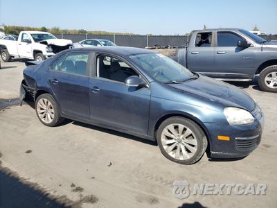 Czwarte zdjęcie samochodu z boku: 2009 VOLKSWAGEN JETTA S VIN:3VWJM71K29M127597 - miniatura