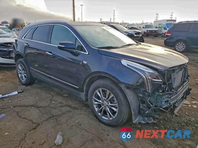 Czwarte zdjęcie samochodu z boku: 2021 CADILLAC XT5 PREMIUM LUXURY VIN:1GYKNDRS5MZ208649 - miniatura