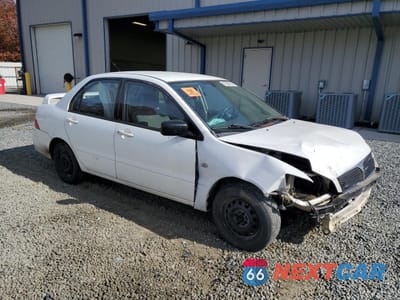 Czwarte zdjęcie samochodu z boku: 2003 MITSUBISHI LANCER ES VIN:JA3AJ26E33U080695 - miniatura