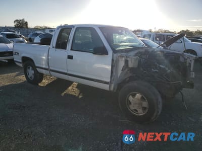 Czwarte zdjęcie samochodu z boku: 1997 GMC SIERRA K1500 VIN:1GTEK19R1VE523397 - miniatura