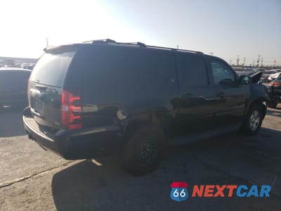 Trzecie zdjęcie samochodu z tyłu: 2012 CHEVROLET SUBURBAN C1500 LT VIN:1GNSCJE02CR268960 - miniatura