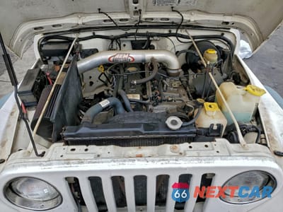 Zdjęcie 12 z 13 samochodu: 1997 JEEP WRANGLER / TJ SPORT VIN:1J4FY19S3VP521333 - miniatura