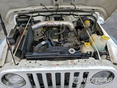 Zdjęcie 12 z 13 samochodu: 1997 JEEP WRANGLER / TJ SPORT VIN:1J4FY19S3VP521333 - miniatura