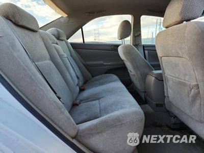 Zdjęcie 10 z 14 samochodu: 2004 TOYOTA CAMRY LE VIN:4T1BF32K44U073065 - miniatura