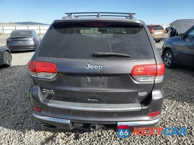 Zdjęcie 6 z 14 samochodu: 2015 JEEP GRAND CHEROKEE SUMMIT VIN:1C4RJFJM1FC804274 - miniatura