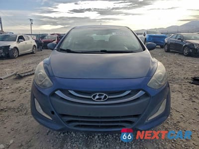 Piąte zdjęcie samochodu w środku: 2014 HYUNDAI ELANTRA GT BASE VIN:KMHD35LH0EU166280 - miniatura