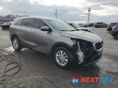 Czwarte zdjęcie samochodu z boku: 2016 KIA SORENTO L VIN:5XYPG4A34GG015034 - miniatura
