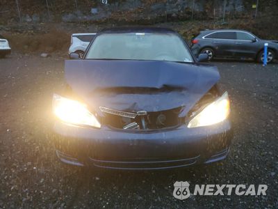Piąte zdjęcie samochodu w środku: 2002 TOYOTA CAMRY LE VIN:4T1BE32K92U577692 - miniatura