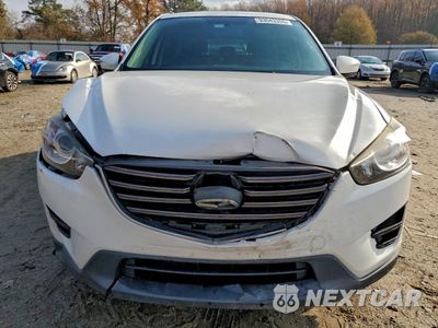 Piąte zdjęcie samochodu w środku: 2016 MAZDA CX-5 SPORT VIN:JM3KE2BY7G0872167 - miniatura