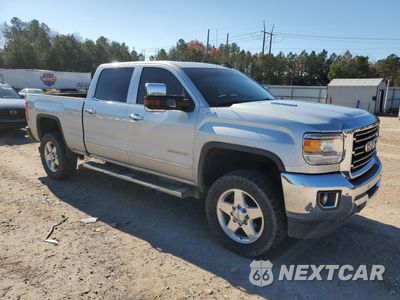 Czwarte zdjęcie samochodu z boku: 2015 GMC SIERRA K2500 SLT VIN:1GT12ZE88FF669284 - miniatura