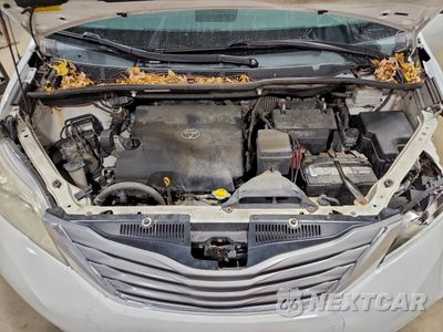 Zdjęcie 12 z 15 samochodu: 2012 TOYOTA SIENNA XLE VIN:5TDYK3DC6CS239671 - miniatura