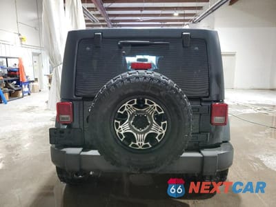Zdjęcie 6 z 12 samochodu: 2013 JEEP WRANGLER UNLIMITED SPORT VIN:1C4BJWDG5DL539119 - miniatura