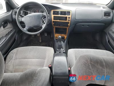 Zdjęcie 8 z 12 samochodu: 1996 TOYOTA COROLA VIN:2T1BB02E1TC175010 - miniatura