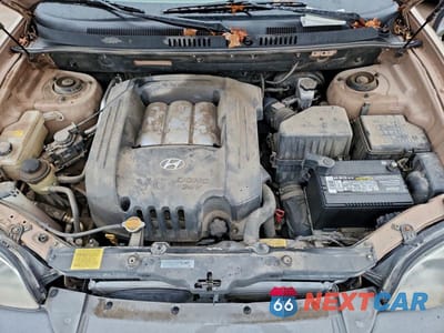 Zdjęcie 12 z 12 samochodu: 2004 HYUNDAI SANTA FE VIN:KM8SC13D84U570097 - miniatura