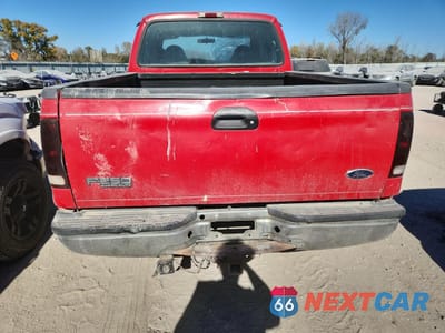 Zdjęcie 6 z 14 samochodu: 2000 FORD F250 SUPER DUTY VIN:1FTNX21FXYEA18620 - miniatura