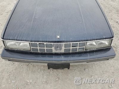 Zdjęcie 11 z 14 samochodu: 1990 OLDSMOBILE 98 REGENCY VIN:1G3CX54CXL4356754 - miniatura