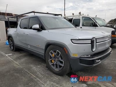 Czwarte zdjęcie samochodu z boku: 2022 RIVIAN R1T LAUNCH EDITION VIN:7FCTGAAL7NN001576 - miniatura