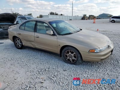 Czwarte zdjęcie samochodu z boku: 2000 OLDSMOBILE INTRIGUE GL VIN:1G3WS52H2YF246349 - miniatura