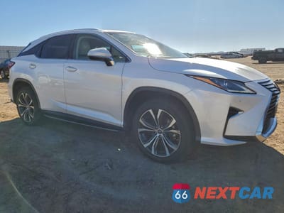 Czwarte zdjęcie samochodu z boku: 2019 LEXUS RX 350 BASE VIN:2T2ZZMCA5KC121829 - miniatura