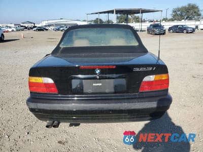 Zdjęcie 6 z 14 samochodu: 1998 BMW 323 IC AUTOMATIC VIN:WBABJ8323WEM21351 - miniatura