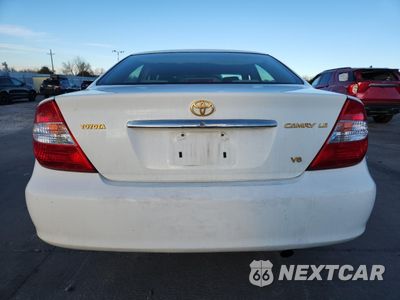 Zdjęcie 6 z 14 samochodu: 2004 TOYOTA CAMRY LE VIN:4T1BF32K44U073065 - miniatura